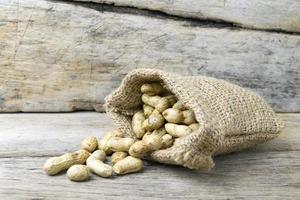 peanut on wooden background photo