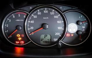 Modern car illuminated dashboard closeup photo