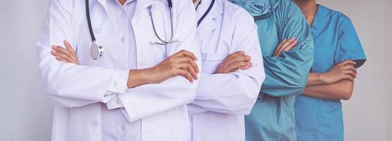 Doctors and Nurses coordinate hands. Concept Teamwork photo