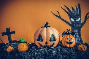 Halloween Pumpkins on soil photo