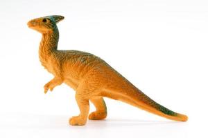 modelo de juguete de dinosaurio parasaurolophus sobre fondo blanco