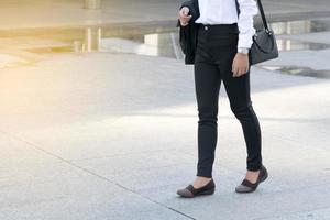 Businesswoman walking, woman photo