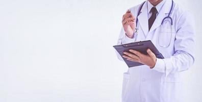 Doctor holding a clipboard with prescription photo