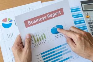 businessman working data document business report. research development planning management concept photo