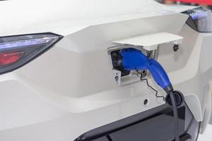 Charging an electric car battery photo