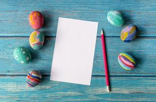 Empty Easter card and Colorful Easter eggs. Easter festive holidays concept. photo