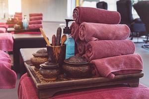 spa treatment accessories with towel and aroma oil photo