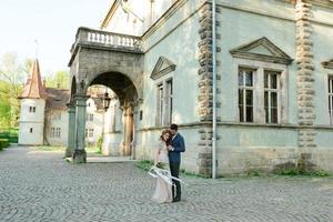 Bride and groom on a walk photo