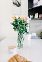 Beautiful pink peony flowers on white table with copy space for your text top view and flat lay style photo