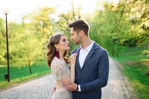 Bride and groom on a walk photo