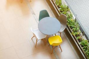 Top view of modern table and chairs photo