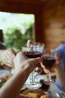 Hands with beverage in glasses celebration party countryside photo