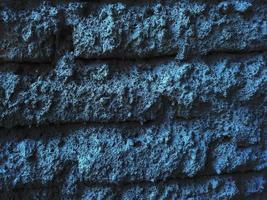 fondo de pared de cemento azul oscuro. grunge abstracto decorativo. banner de textura de estilo de arte áspero foto