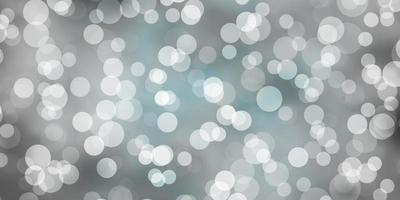 Light BLUE vector background with circles.