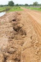 Gravel road in rural split apart. photo