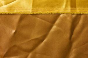 Cloth which overlaps with yellow gold. photo