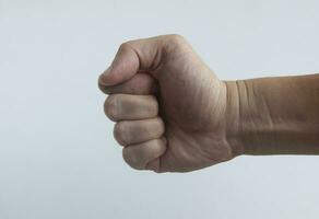 Straight view of hand fist on white background.