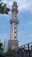 mosque minaret in the city photo