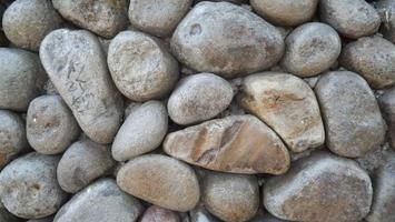 una pared compuesta de piedras que forman una decoración foto