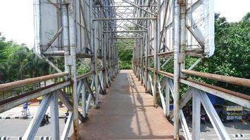 photo of pedestrian bridge in the city