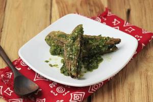 Stir Fry Cob Tuna Fish with Green Chilli Tongkol Cabe Ijo, Indonesian Daily Food Recipe. photo
