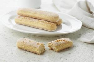 Italian Cookie Savoiardi. Ladyfinger Sweet Biscuits. Sponge Cookies Tiramisu photo