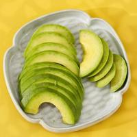 Sliced Avocado on a Plate photo