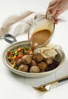 Pour Brown Mushroom SAuce to Swedish Meatball photo