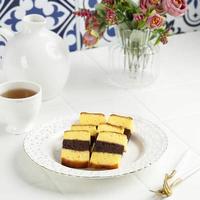 Spiku or Lapis Surabaya, the Layers Rich Egg Yolk Cake with Strawberry Jam in Between photo