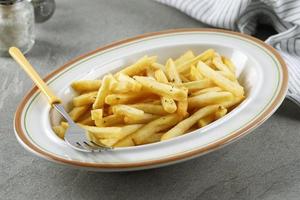 Portion of French Fries on WHite Plate