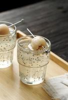 Bird Nest Ice or Es Sarang Burung, Indonesian Traditional Refreshment Made from Shredded Jelly, Basil Seed, Lyche, Simple Syrup, and Nata de Coco. Popular for Iftar Ramadan or Takjil.