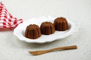 Bolu Sakura Steamed Caramel Cake, Made from Caramel with Cake Batter from Egg, Sugar, Flour, and Butter. photo