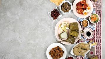 Ketupat Lebaran Ied Menu Dish, Opor Ayam, Sambal Goreng Ati Kentang, Balado Telur, Dates Fruit, Sambal, and Tea. photo