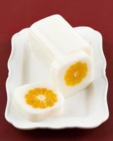 Milk Pudding with Fresh Orange at the Center photo