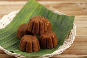bolu sakura or steamed caramel cake, made from caramel with cake batter from egg, sugar, flour, and butter photo