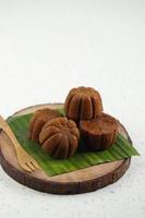 Bolu Sakura Steamed Caramel Cake, Made from Caramel with Cake Batter from Egg, Sugar, Flour, and Butter. photo