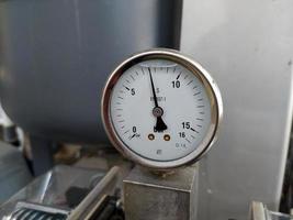 Pressure gauge tool equipment, measurment water pressure in industrial machinery. photo