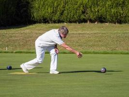 ISLE OF THORNS, SUSSEX, UK, 2016. Lawn Bowls Match at Isle of Thorns photo