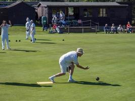 ISLE OF THORNS, SUSSEX, UK, 2016. Lawn Bowls Match at Isle of Thorns photo