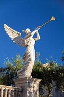 LAS VEGAS, NEVADA, USA, 2011. Angel Playing a Golden Bugle photo