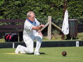 ISLE OF THORNS, SUSSEX, UK, 2016. Lawn Bowls Match at Isle of Thorns photo