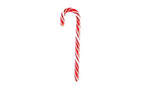 Christmas candy-Santa's striped cane on a white background, isolate. Close up. Christmas, new year. Decoration, sweetness, candy, treats for children photo