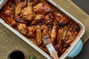 Barbecue chicken wings. Slow cooker sweet and spicy. Oven baked marinated chiken photo