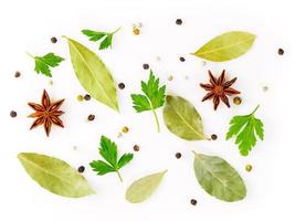 Set of spices on white background, top view. Seasonings for meat broth photo