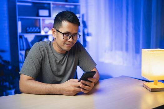 Social media and digital online concept, man using smart phone with Social media. The concept of living on vacation and playing social media. Social Distancing ,Working From Home concept. photo