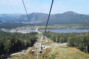 funicular at the all-season ski resort in Altai and Lake Manzherok photo