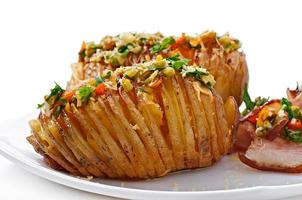 Baked potato with cheese and butter photo