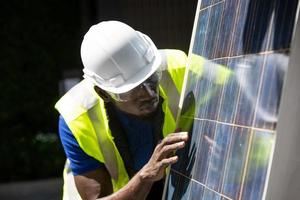 Solar panels on a country hillside on a bright sunny day providing sustainable renewable energy source to the local residents alternative photo