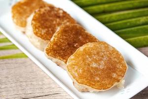 Thai Coconut Pancake  kanom babinpopular dessert in street food photo