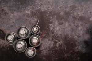 set of color spray bottles or car polish spray on Concrete background ,With space for text photo